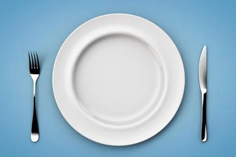 Empty plate on the table. Dietetics topic. Top view. Foto stock