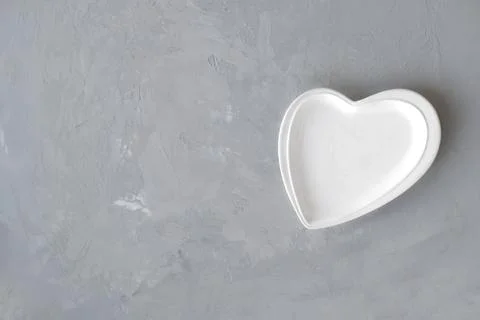 Empty plate on Ultimate Gray background for valentine's day. restaurant menu. Stock Photos