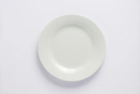 Empty plate on white  background Stock Photos