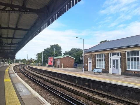 Empty platform and curving railway tracks at the classic Margate train station Stock Photos