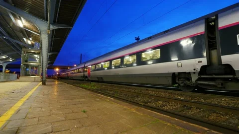 Empty platform of Selestat station, high speed train depart from opposite side Stock Footage 159504042