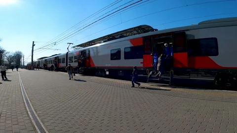 The empty platform at the station is quickly filled with people Stock Footage 183475188