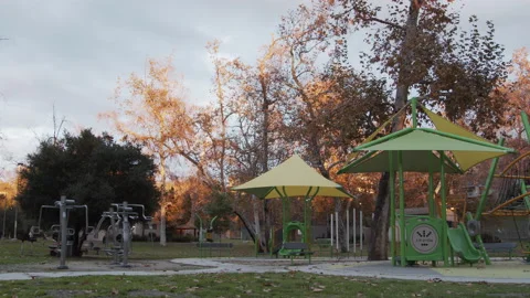 Empty Playground After Rain Covid 19 Coronavirus Lockdown Quarantine Sunset Wide Stock Footage 147589836