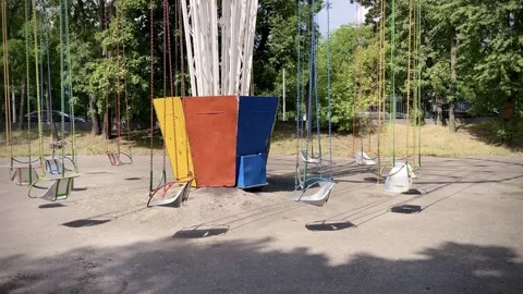 Empty playground, carousel in the park Stock Footage 254578543