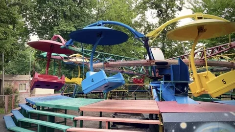 Empty playground, carousel in the park Stock Footage 254578599