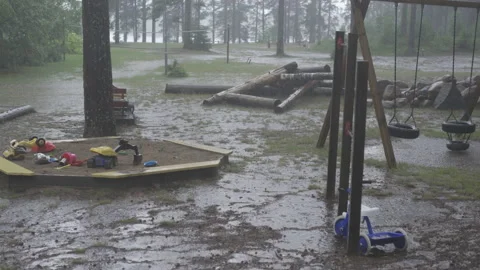 Empty playground during heavy rain. Abandoned toys. Stock Footage 158818811