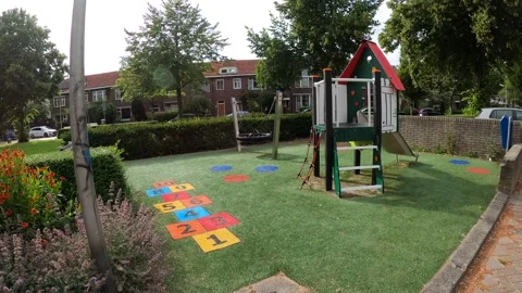 Empty playground in Dutch suburb Stock Footage 157665997