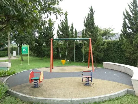 Empty Playground in Green Park Stock Photos