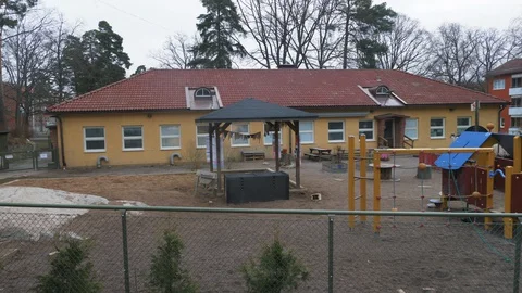 Empty playground at kindergarten during Covid-19 Coronavirus pandemic outbreak Stock Footage 129112796