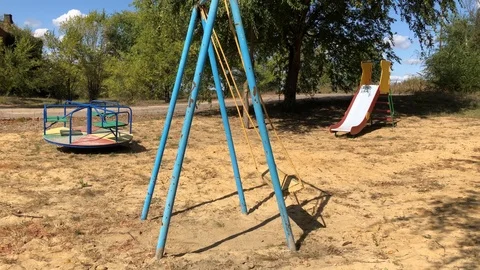 An empty Playground with an old swing. Stock Footage 116468531