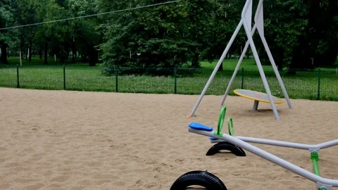 Empty playground on rainy day. Видео 85710345