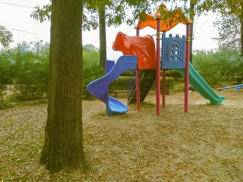 An empty playground in serene silence evokes nostalgia and quiet reflection Stock Photos