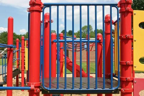An empty playground set in a park Foto stock