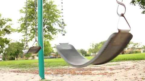 Empty playground swing Stock Footage 33577477