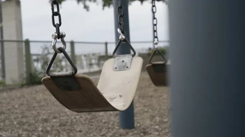 Empty Playground with Swing Swinging Stock Footage 169594445