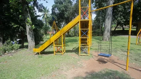 Empty Playground Swings Stock Footage 122847812