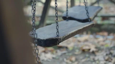 Empty playground swings move slow motion Stock Footage 330047180