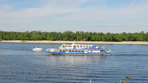Empty pleasure boat on river Dnipro in Kyiv, Ukraine - Editorial, 4K, Handheld Stock Footage 176399794