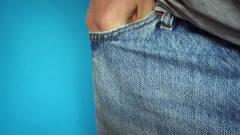 Empty pockets. Man looking for money in an empty pocket Stock Footage 192934164