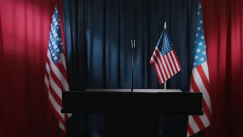 Empty Podium with American Flags Standing in Press Conference Room Stock Footage 337067011