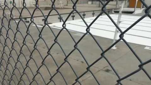 Empty Pool Abstract Through Chain Link Fence Video stock 117139216