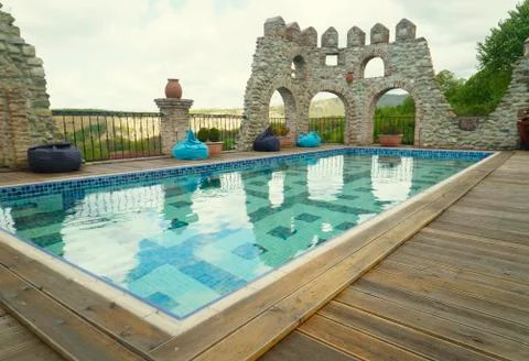 Empty pool in modern hotel Stock Photos