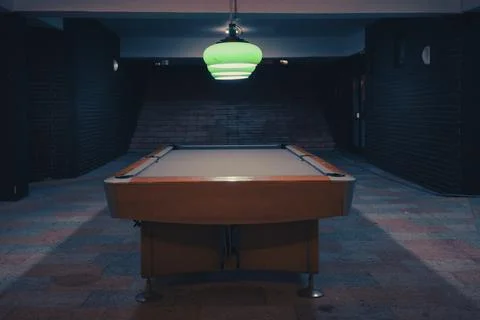 An empty pool table in an empty space Stock Photos