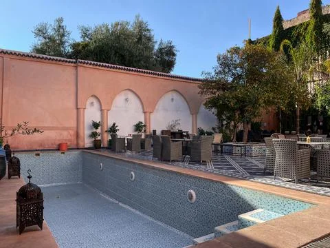 Empty pool of a traditional riad in the old medina of Fez Stock Photos
