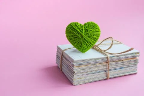 Empty postcard, postcrossing, green heart love letter Stock Photos