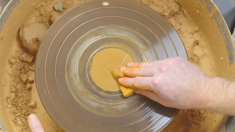 Empty Potter's wheel spinning Stock Footage 104744509