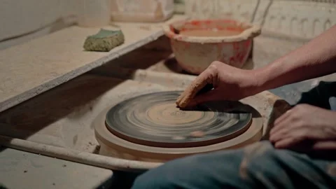 An empty pottery wheel, preparing surface for clay artworks. Professional Video stock 254854546