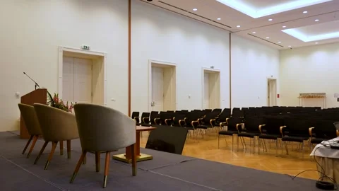 Empty presentation hall with projector and seating arrangement Stock Footage 336622171