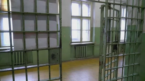 An Empty Prison Cell With The Door Standing Open. Stock Footage 201311728