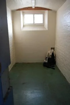 Empty Prison Cell Interior With Natural Light At Shrewsbury Prison, Shropshire, Stock Photos