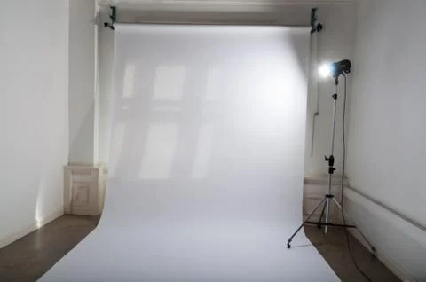 An empty professional photo studio with clean and simple photographic equipment Stock Photos