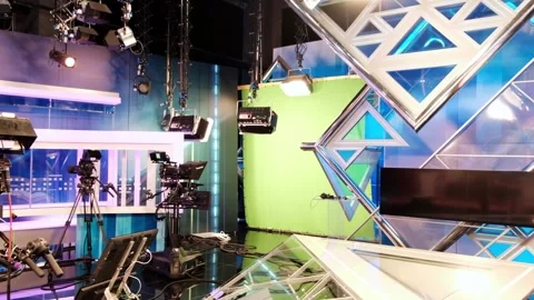 Empty professional television broadcast studio set featuring green screen b.. Stock Footage 339459177