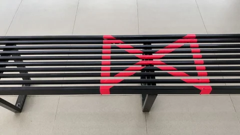 Empty Public Bench with Distancing Mark During Covid-19 Pandemic Stock Footage 156438581