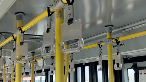 Empty Public Bus Interior Yellow Poles Overhead Grab Handles — Urban Transit Stock Footage 335384853