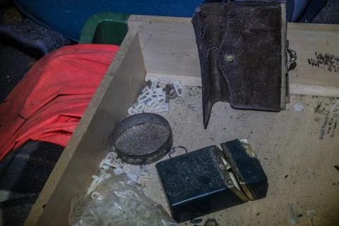 Empty purse and objects in a drawer Stock Photos