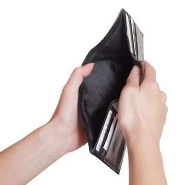 Empty purse in a female hands. Stock Photos