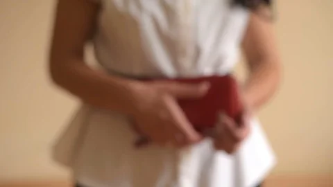 Empty purse in women's hands Stock Footage 77025349