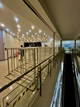 Empty Racks and Escalator View in the Mall Stock Photos