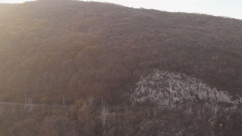 Empty railway in the mountains between the trees in the fall. Beautiful light Stock Footage 119706909