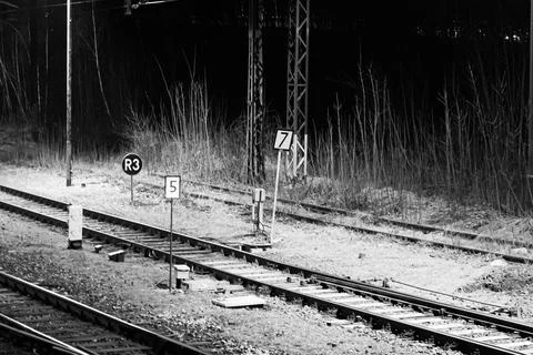 Empty railway tracks at night Stock Photos