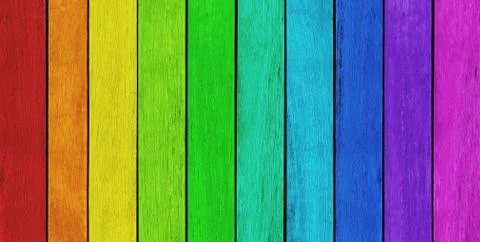 Empty, rainbow colored wood background, texture with copy space Stock Photos