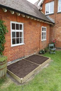Empty raised bed in kitchen garden Foto stock