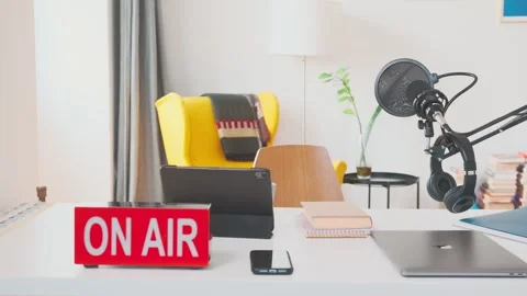 Empty recording studio for radio host with on air button near microphone on desk Stock Footage 251543928