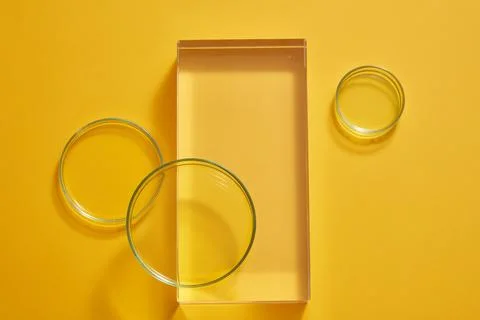 Empty rectangle transparent podium displayed on light background with some gl Stock Photos