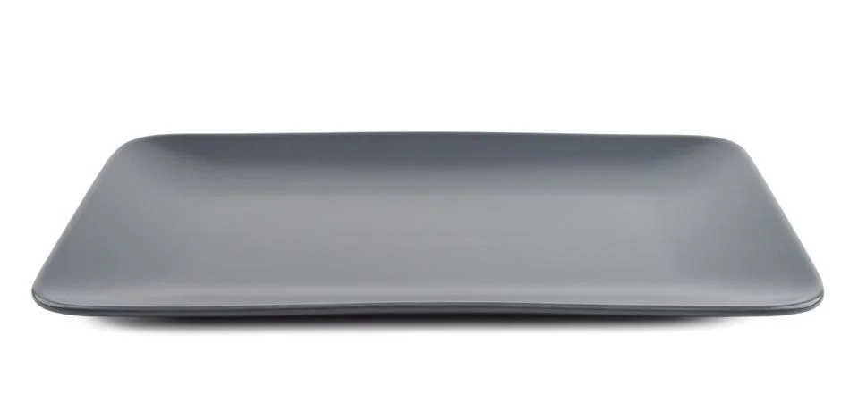 Empty rectangular black plate isolated on white background Stock Photos