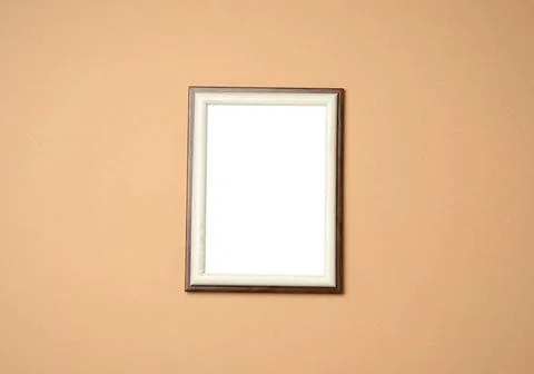 Empty rectangular blank wooden frame, beige background empty rectangular b... Stock Photos
